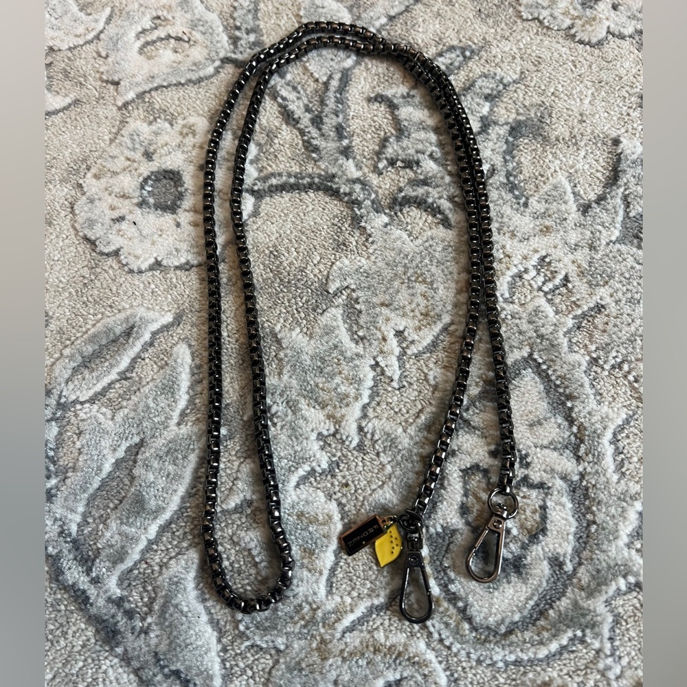 gunmetal-colored metal flat curb or box chain crossbody purse strap with swivel